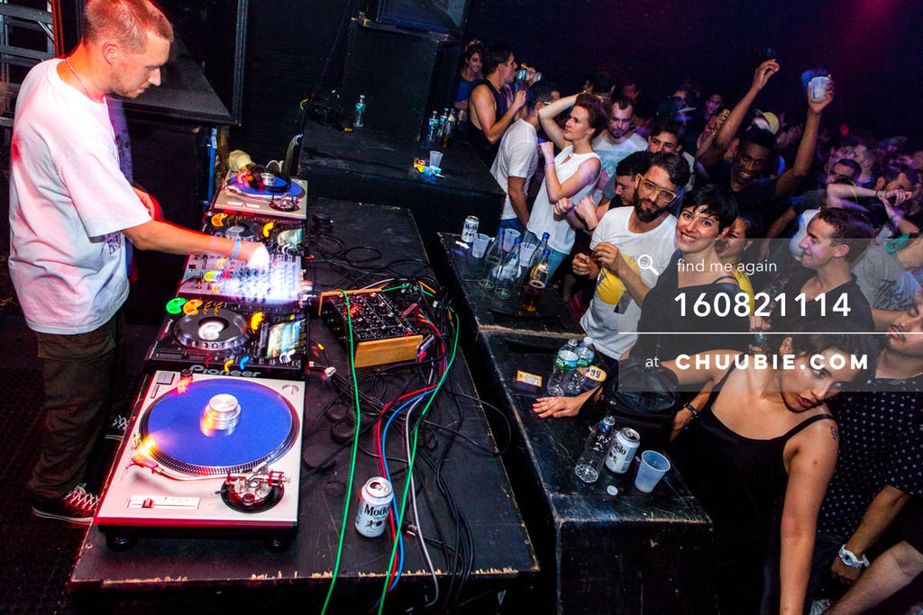 160821114 | 
Joy Orbison (Peter O'Grady) DJing to a packed dance floor with arms in the air.
Electric Minds 1... | Team Chuubie