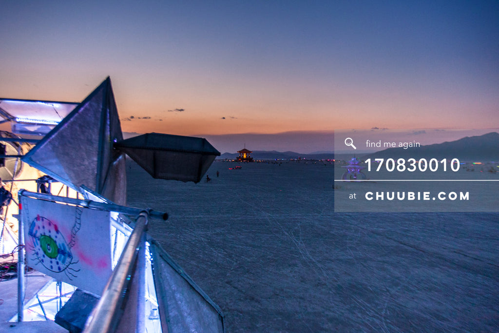 170830010 | 
BAAAHS art car (perspective view) on the playa at sunrise Wednesday, after Tuesday night's party... | Team Chuubie