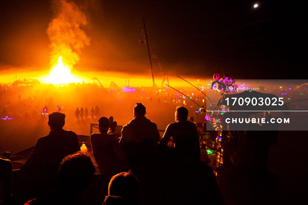 170903025 | 
The boys of BAAAHS camp sit atop art car watching theĀ Temple BurnĀ in the distance.
āBurning Man ... | Team Chuubie