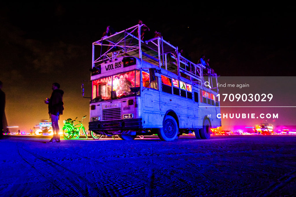 170903029 | 
WOOL BUS, is the BAAAHS camp's art bus – indirectly illuminated here by ambient purple and pink ... | Team Chuubie