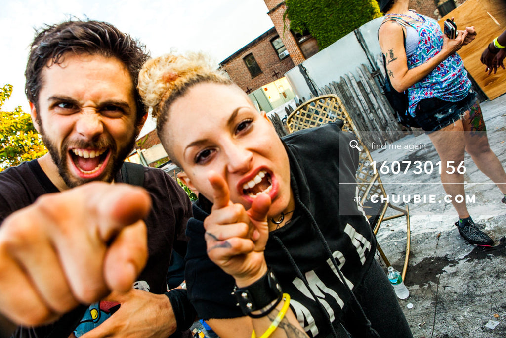 160730156 | Guy and athletic punk girl in cutoff RAMPAGE sportswear sweatshirt serving attitude to camera fin... | Team Chuubie