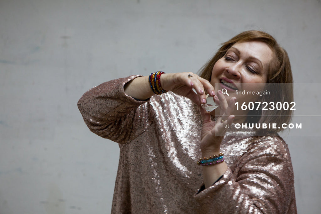 160723002 | Actress Tamara Torres playing with jewel in between shots. 
Photographed in SoHo, New York; July... | Team Chuubie