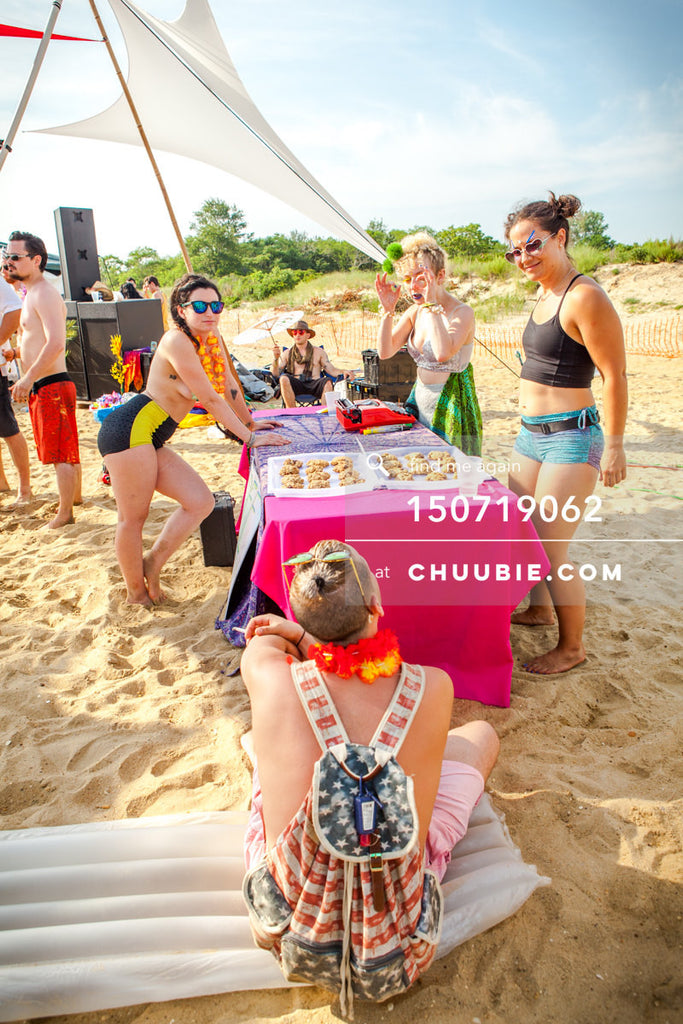 150719062 | 
Massage table experiences in open air pavilion tent on the beach playa.
—Gratitude Migration 201... | Team Chuubie