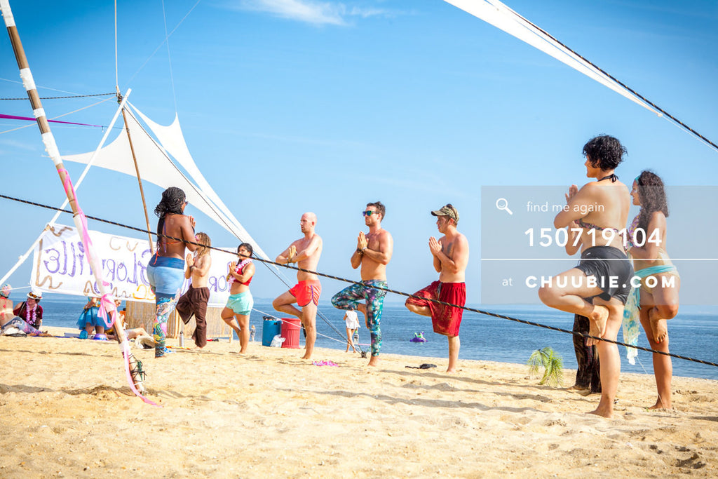 150719104 | 
Tree pose (Vrksasana), beach yoga class.
—Gratitude Migration 2015: Summer Dream. Morning Gloryv... | Team Chuubie