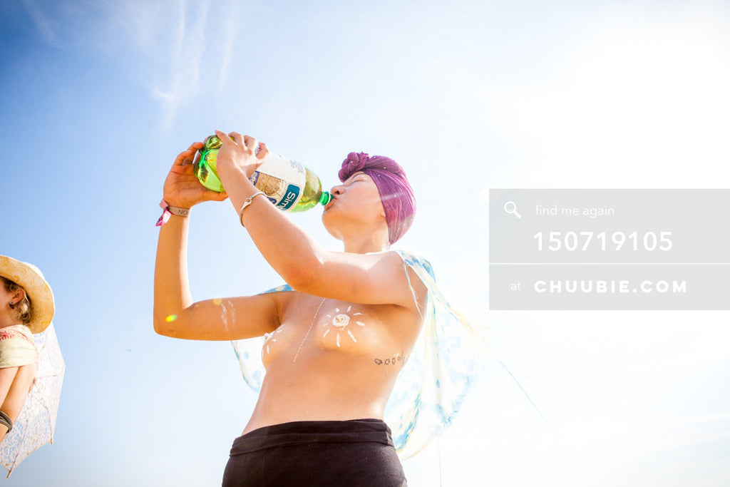 150719105 | 
Glitter fairy quenches thirst.
—Gratitude Migration 2015: Summer Dream. Morning Gloryville camp.... | Team Chuubie