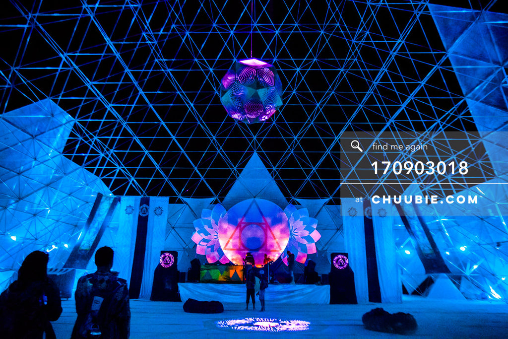 170903018 | 
The Pyramid (view from inside with people) at Burning Man 2017 was an enormous, geometric, sooth... | Team Chuubie