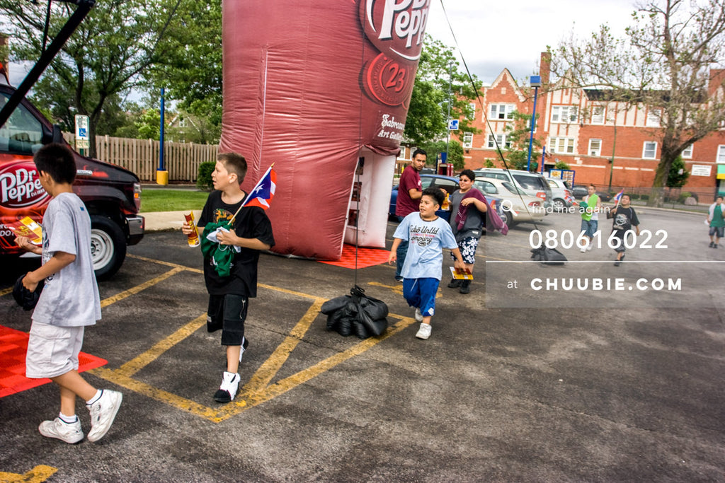 080613022 | 
Group of neighborhood kids running to check out the prize wheel.

—Dr. Pepper Sabrosura mobile t... | Team Chuubie