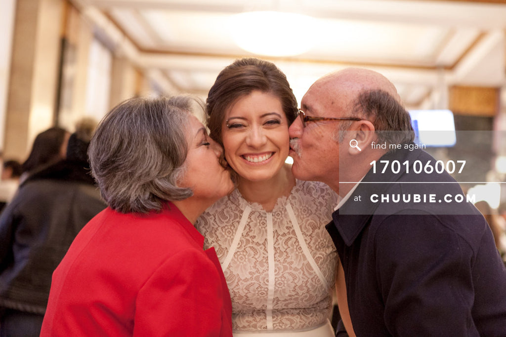 170106007 | Bride gets kisses on the cheek from parents
—Jenn & Andres' NYC City Hall Wedding. City Clerk... | Team Chuubie