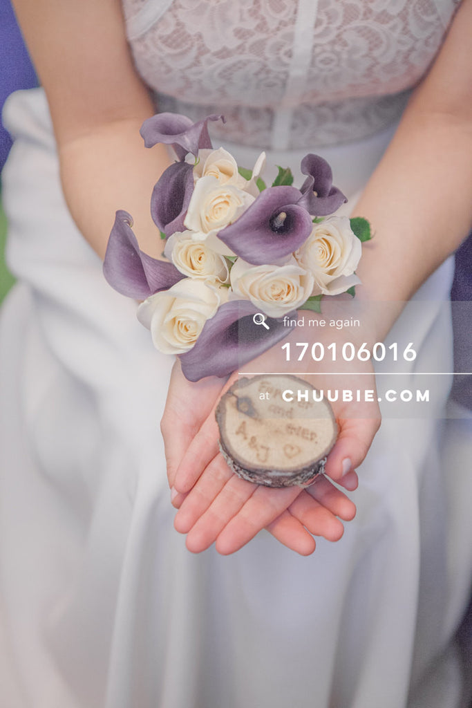170106016 | Bride holds lavender & yellow bouquet of flowers; and special custom inscribed wedding ring b... | Team Chuubie