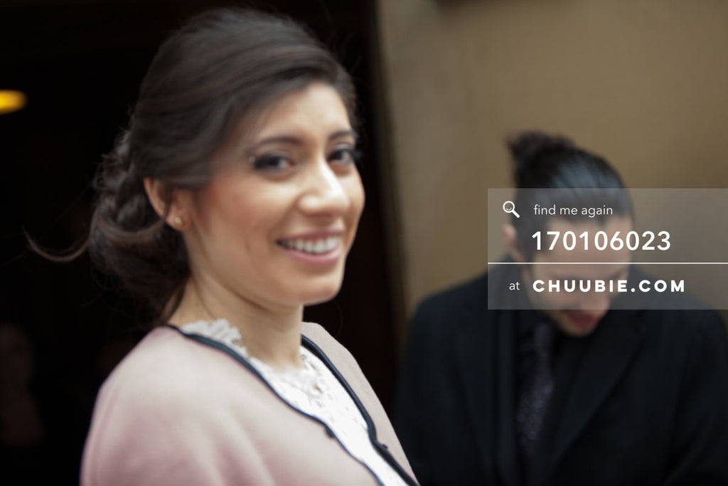 170106023 | Soft-focus shot of Bride & Groom exiting NYC City Clerk's Office after wedding ceremony
—Jenn... | Team Chuubie