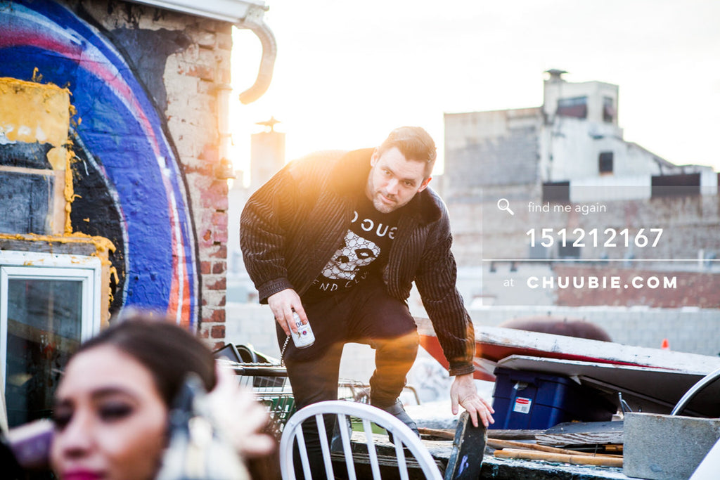 151212167 | 
Guy climbing on roof with sunburst behind at Brooklyn warehouse rooftop sunrise.
— Sublimate &am... | Team Chuubie