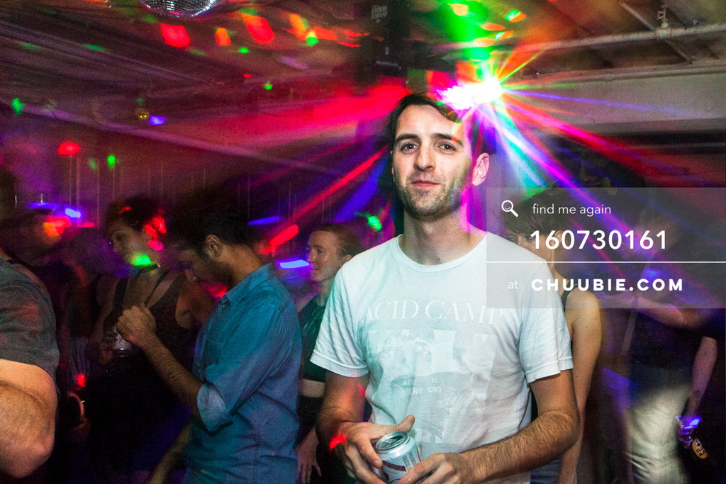 160730161 | Portrait of Faso (DJ Faso) lit by ambient color disco lights, during Sublimate closing set.
— Sub... | Team Chuubie