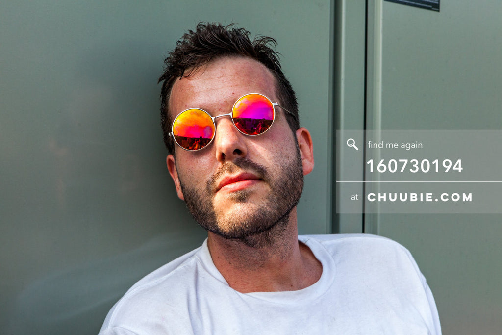 160730194 | DJ Gattis with iridescent sunglasses on summer Brooklyn rooftop.
 
— Sublimate & Ruse Labs pr... | Team Chuubie